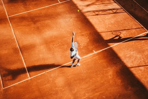 What level of intensity is playing a singles tennis match