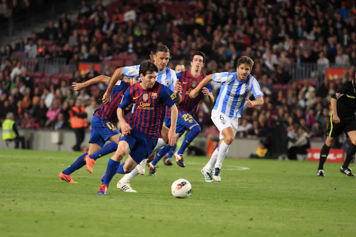 messi dribbling ball